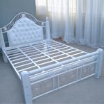 White Metal Framed Bed